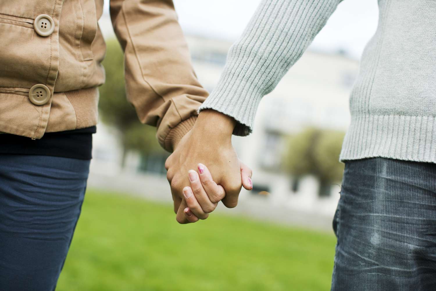 midsection of a teenage couple holding hands 159637302 9db48f16d122436595a068d4323bdd3f